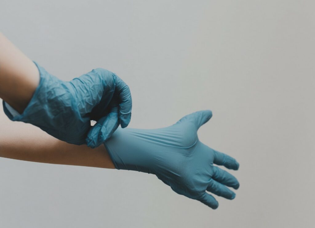 doctor snaps gloves